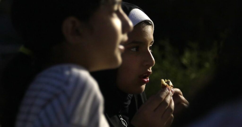 Kids are balancing fasting and school during Ramadan. How to support them